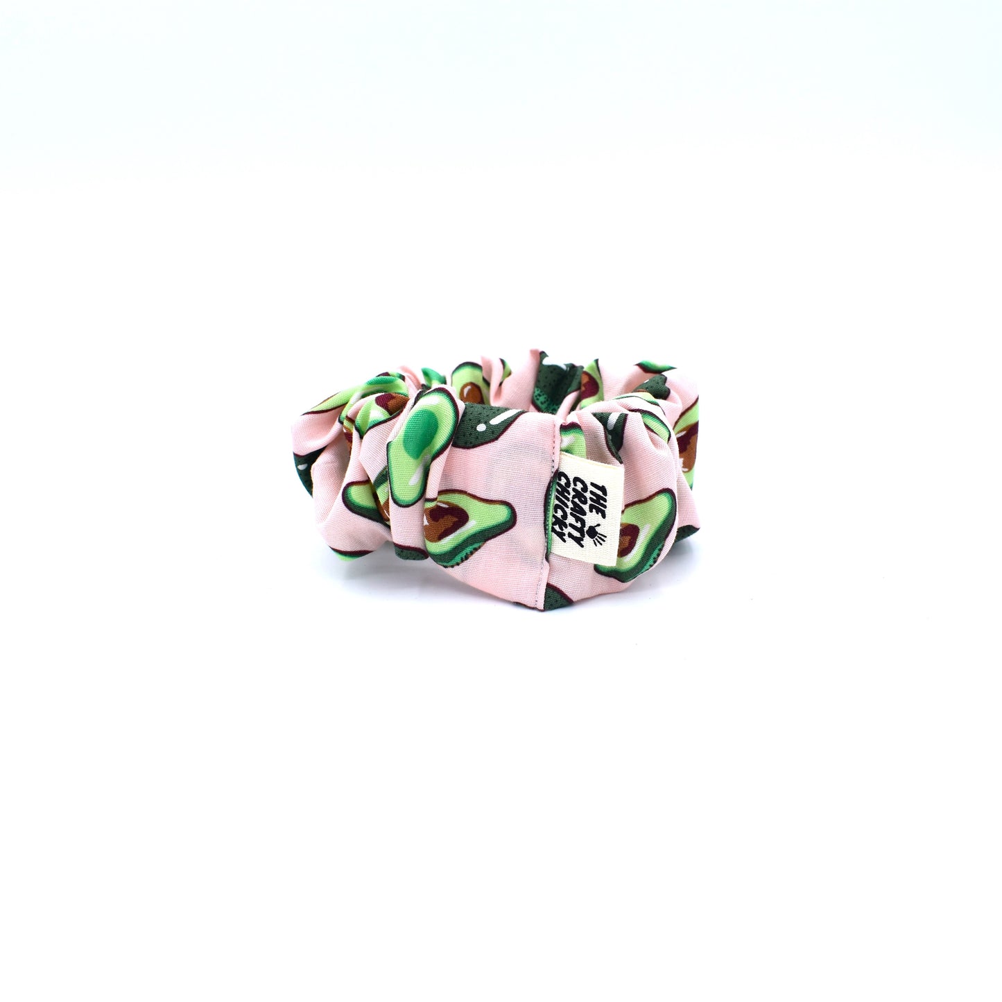 Pink avocado patterned scrunchie with The Crafty Chicky tag